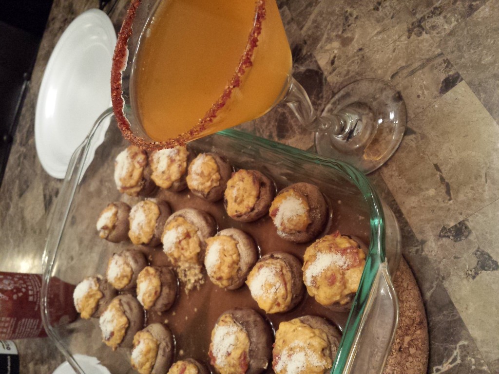 Cream cheese and bacon stuffed mushrooms with Parmesan on top