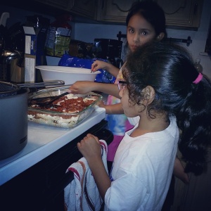 Helping make lasagna!